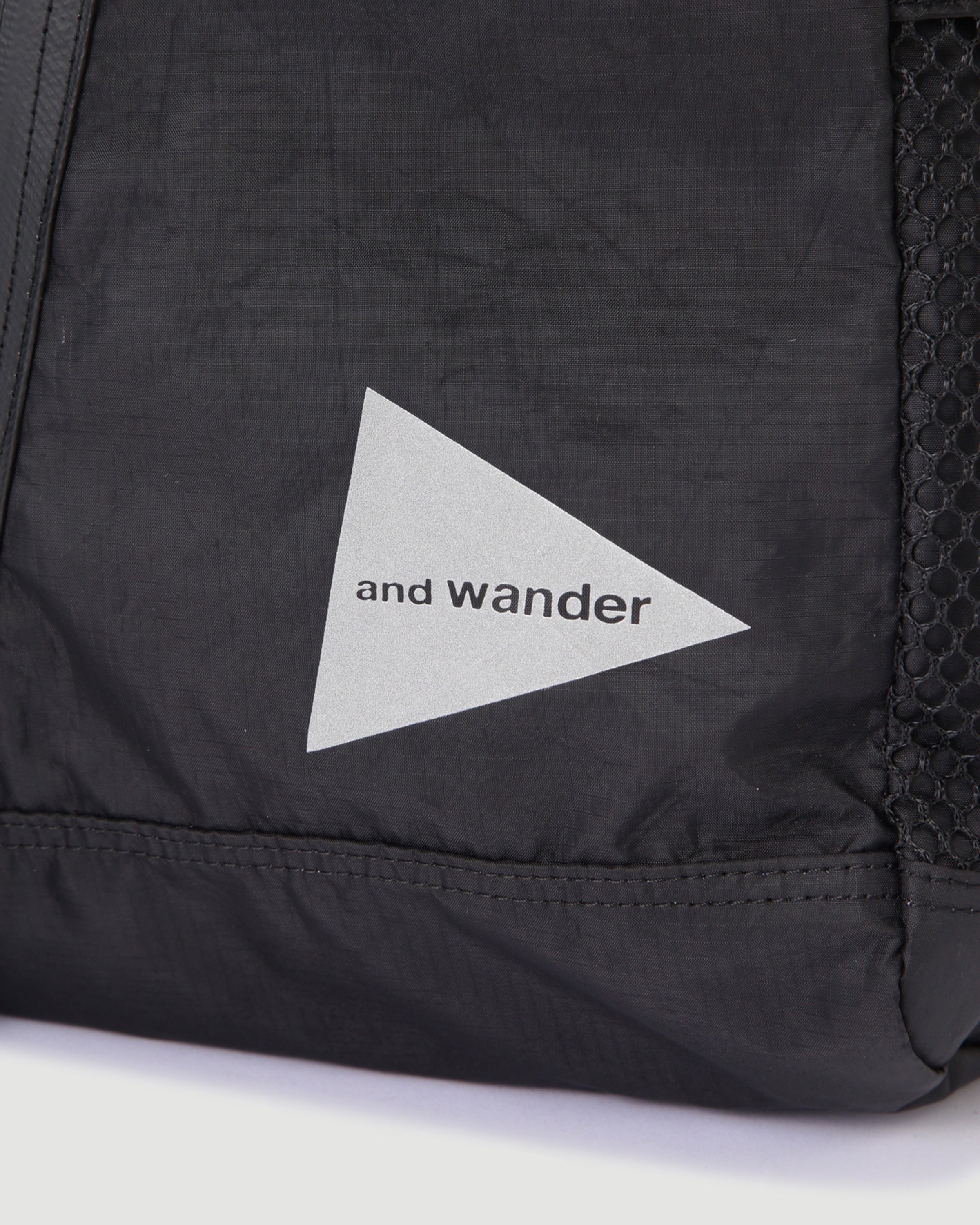 And Wander ECOPAK 30L Backpack Black Bags Unisex